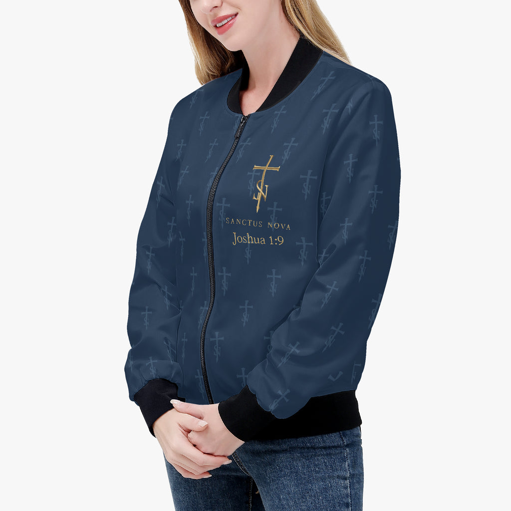 Close front view of the Royal Navy signature bomber, showing the complete gold cross-SN, SANCTUS NOVA name and Joshua 1:9.