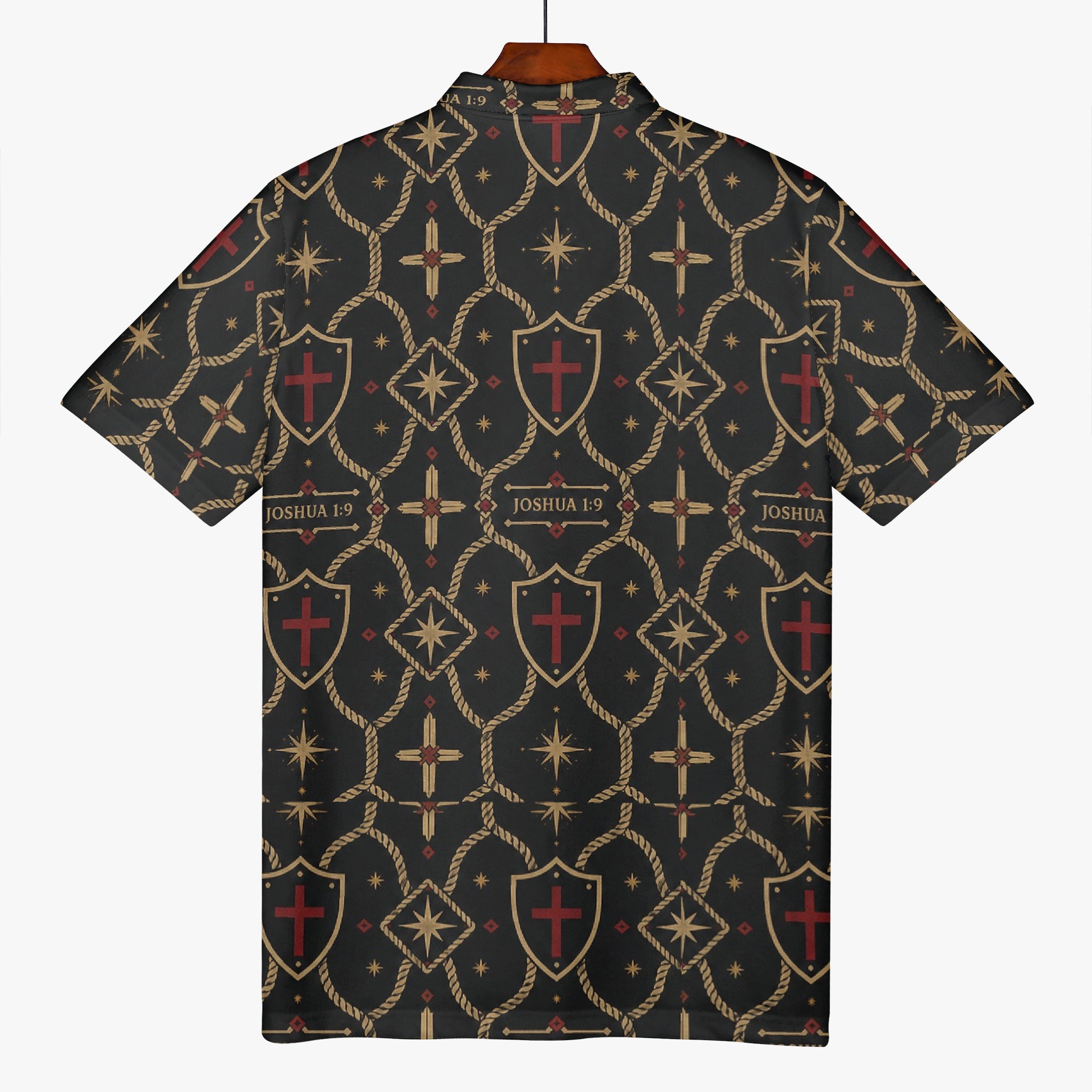 SANCTUS NOVA polo in the signature monogram on a hanger — gold trellis, shields and oxblood crosses on charcoal