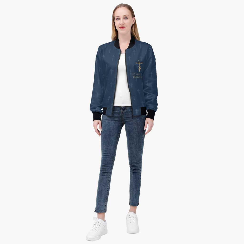 Full-length model wearing the SANCTUS NOVA Royal Navy signature bomber jacket with black ribbed trim and tonal cross-SN repeat.
