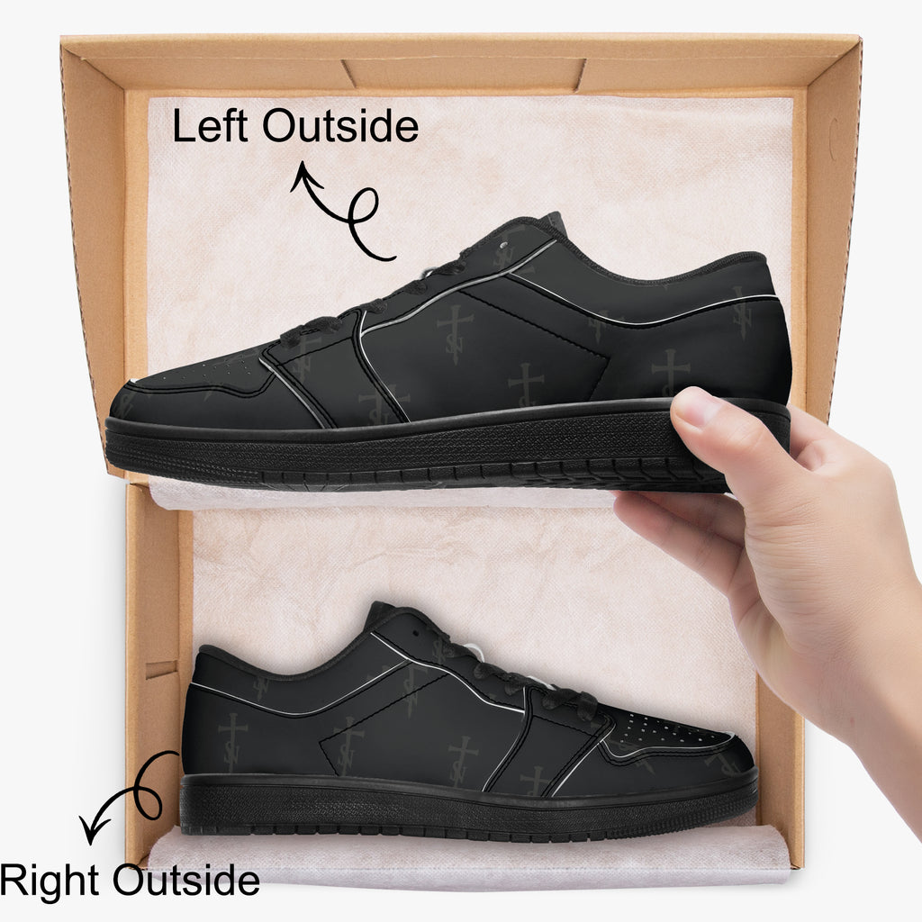 SANCTUS NOVA Deep Black sneakers displayed in a box, showing both outside profiles.