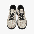 SANCTUS NOVA CARRY THE STANDARD low-top sneaker in the ivory monogram, angled view